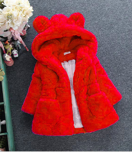 A girl's fur coat for autumn and winter