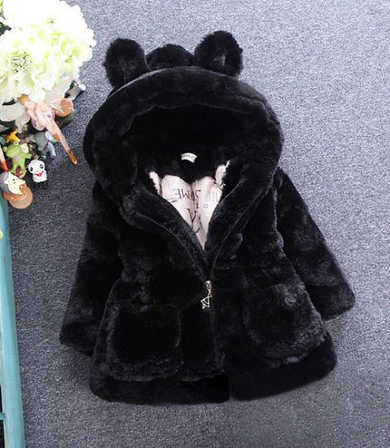 A girl's fur coat for autumn and winter